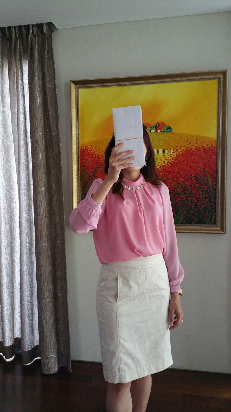 very pretty peach chiffon blouse, further augmented by the n...