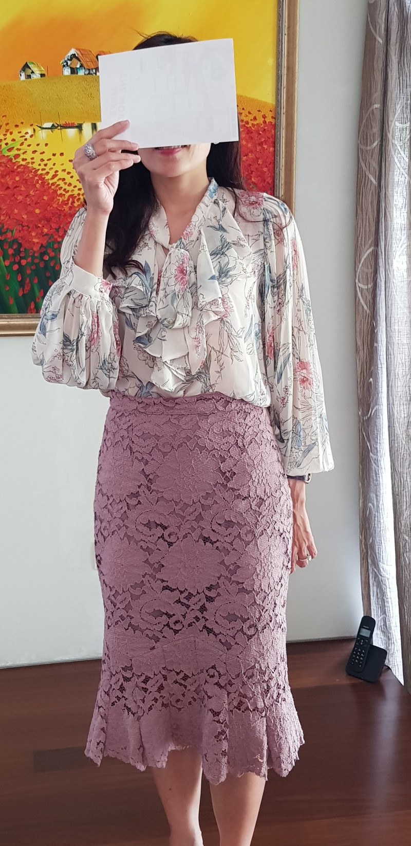 A lovely blouse and matching skirt-feminine look. 
