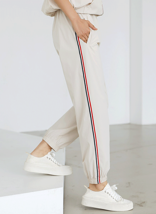 [The Onme] Contrast Stripe Tape Jogger Pants